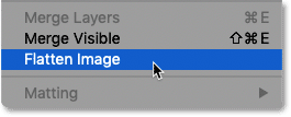 Choosing the Flatten Image command in Photoshop