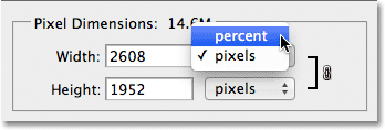 Changing the measurement type from pixels to percent in the Image Size dialog box. Image © 2012 Photoshop Essentials.com