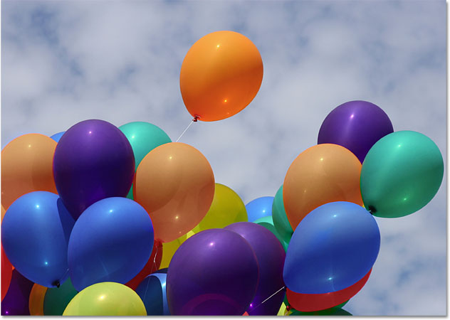 The balloons after reducing their color saturation. Image © 2010 Photoshop Essentials.com